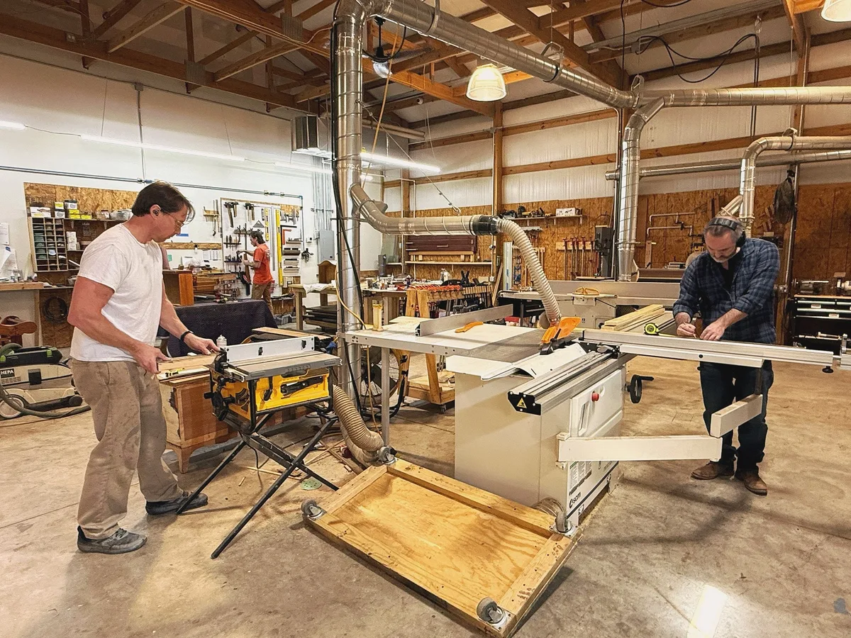 Furniture repair craftsman at work in workshop